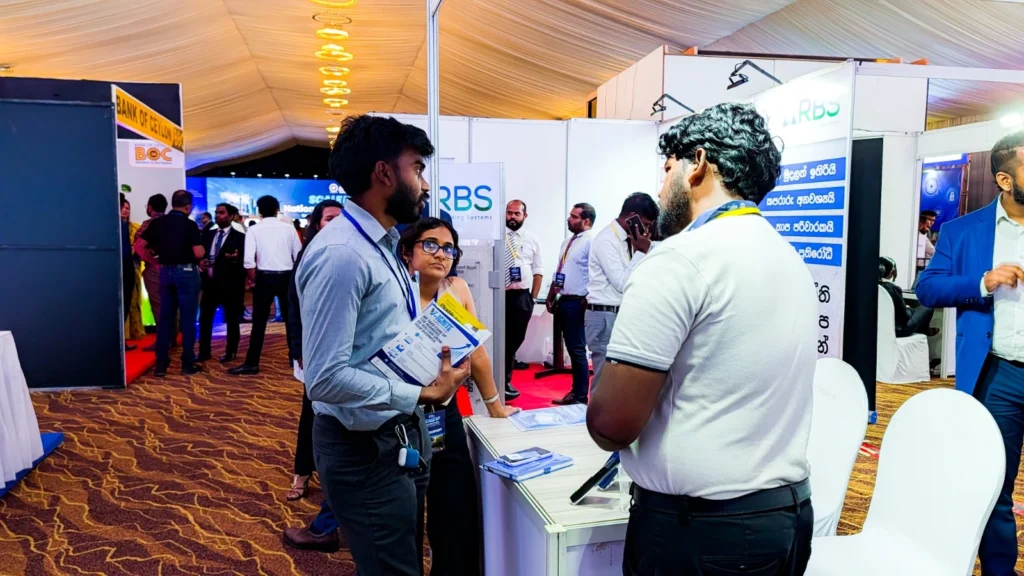 Pay&Go team explaining POS solutions to customers.